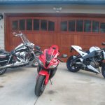 Motorcycles in front of Wood & Glass Garage Door